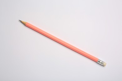 Photo of One new graphite pencil on white background, top view