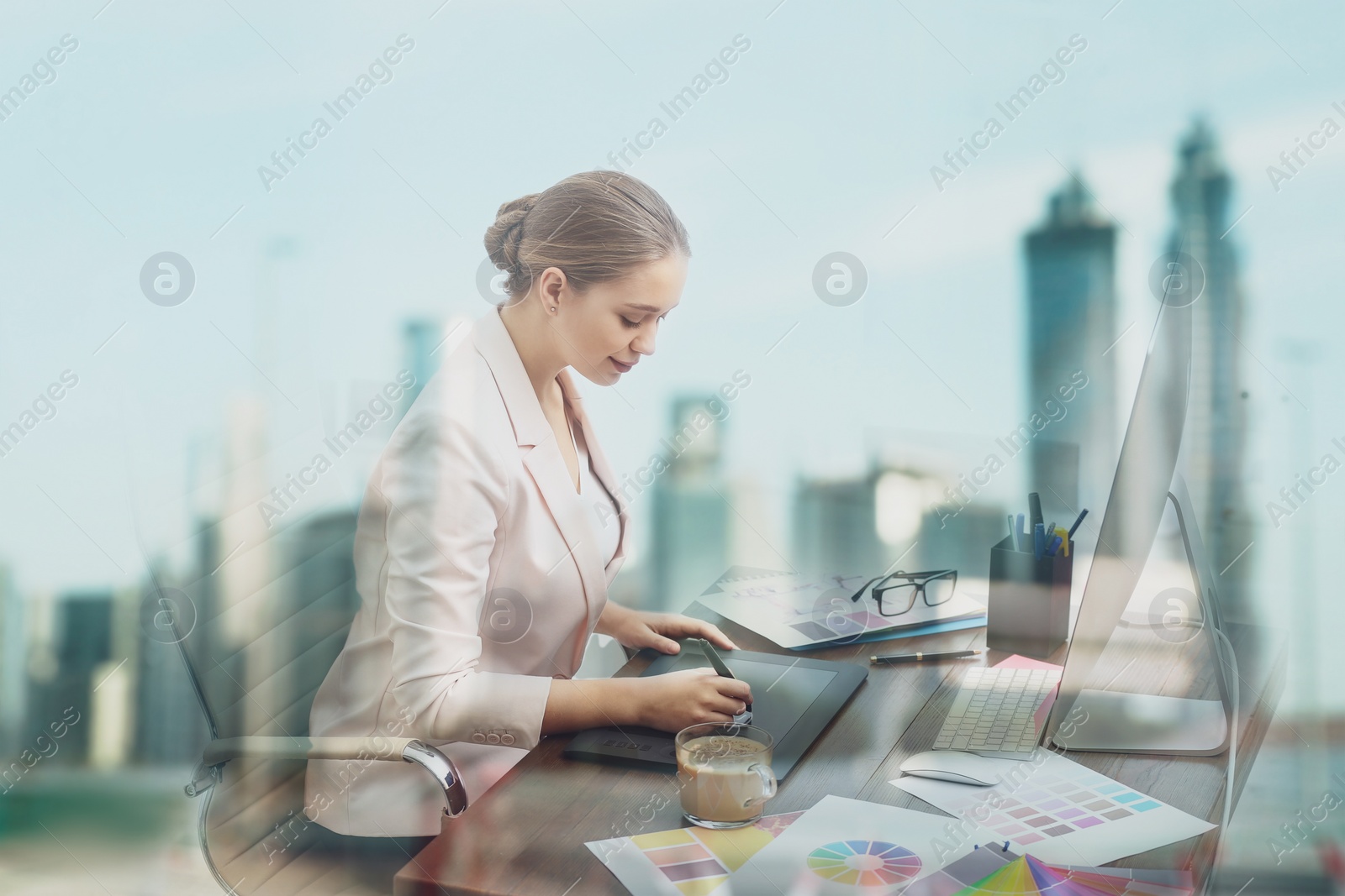 Image of Double exposure of female designer and cityscape 