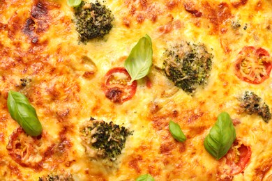 Photo of Delicious homemade vegetable quiche as background, closeup