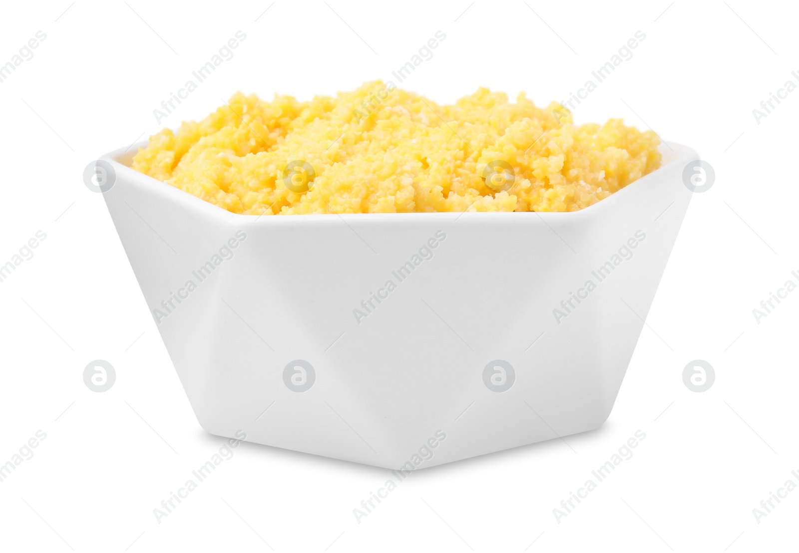 Photo of Cooked cornmeal in bowl isolated on white