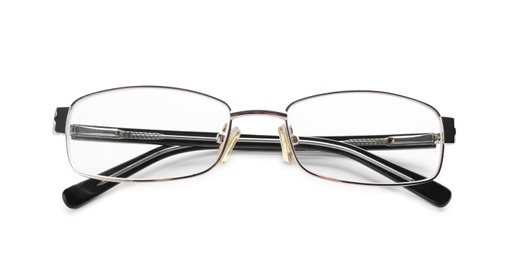 Photo of Glasses with corrective lenses on white background. Vision problem