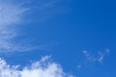 Photo of Picturesque blue sky with white clouds on sunny day