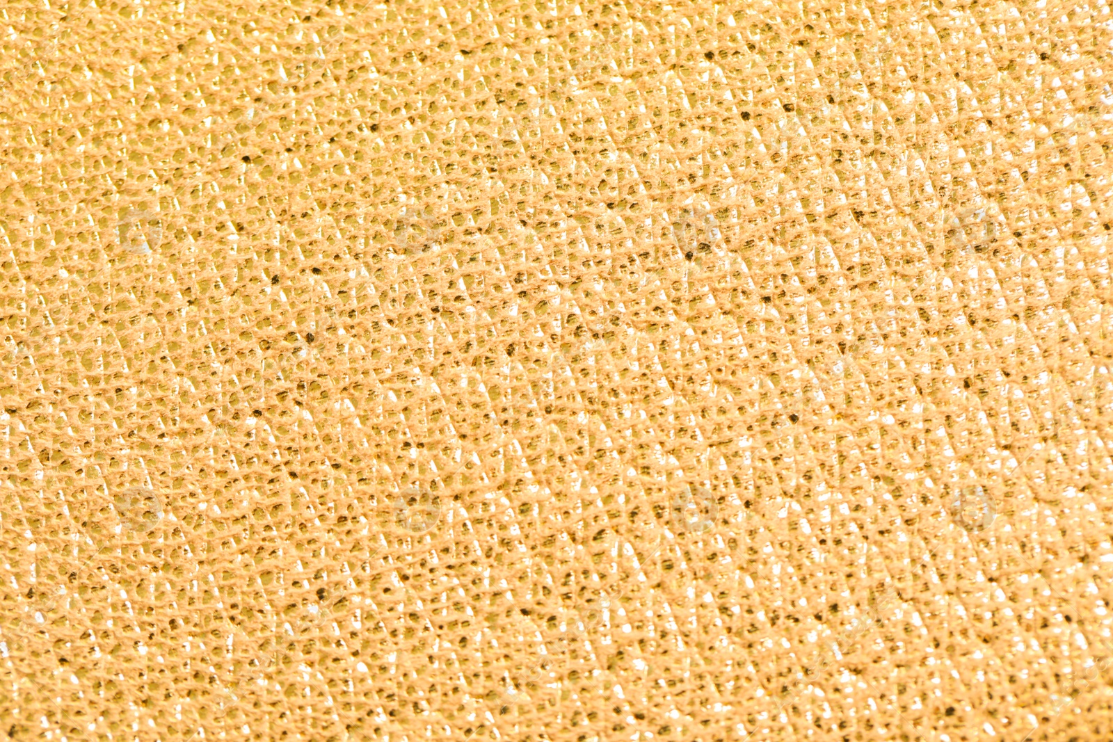 Photo of Beautiful golden texture surface as background, top view