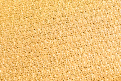 Photo of Beautiful golden texture surface as background, top view