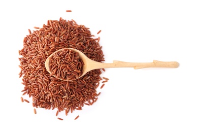 Photo of Spoon and uncooked brown rice on white background, top view