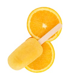 Photo of Tasty orange ice pop isolated on white, top view. Fruit popsicle