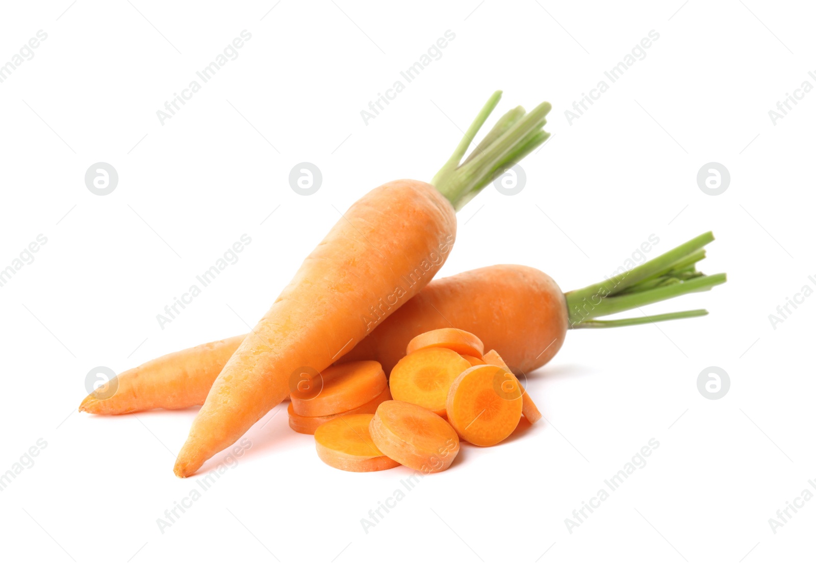 Photo of Whole and cut ripe carrots isolated on white