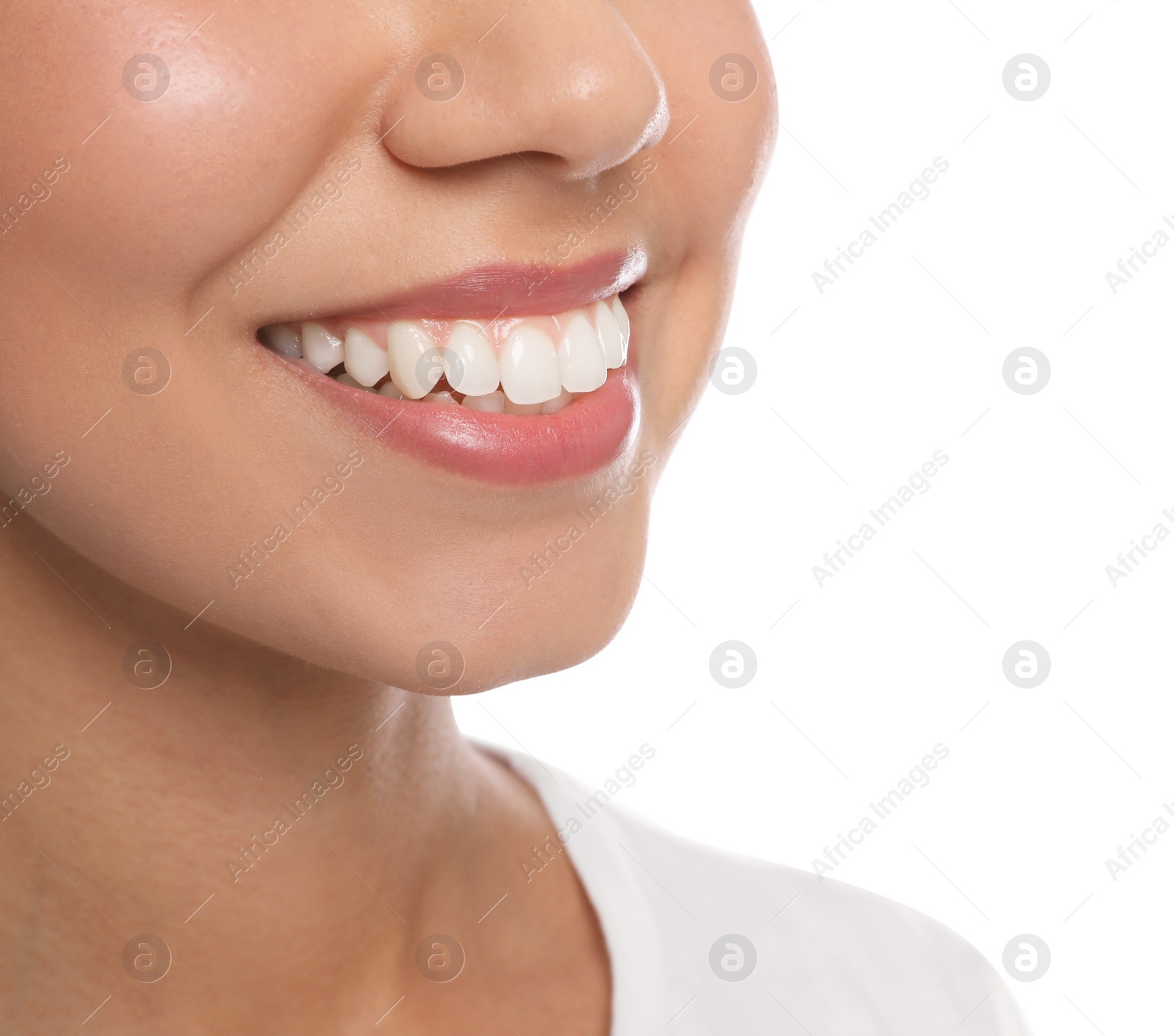 Photo of Young woman with healthy teeth on white background, closeup