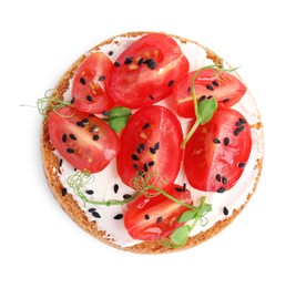 Photo of Tasty rusk with cream cheese, fresh tomatoes and black sesame seeds isolated on white, top view