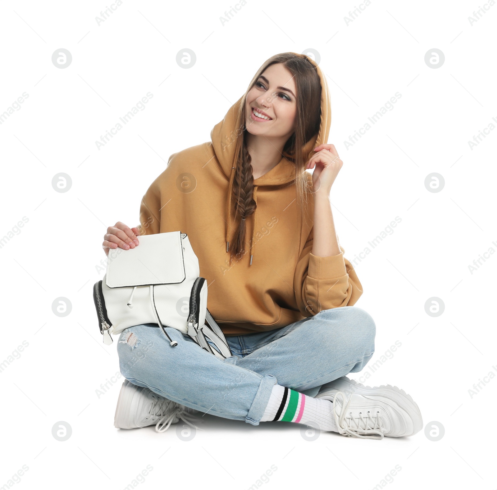 Photo of Beautiful young woman in casual outfit with stylish bag on white background