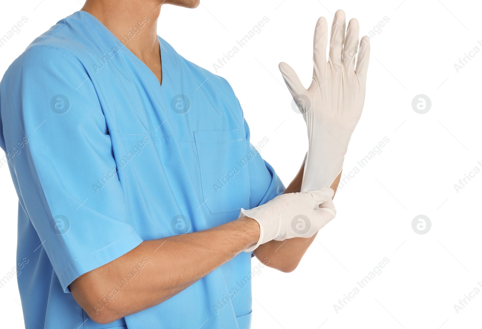 Photo of Male doctor putting on rubber gloves against white background. Medical object