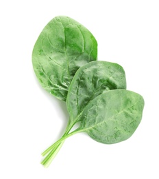 Photo of Fresh green healthy baby spinach leaves isolated on white, top view