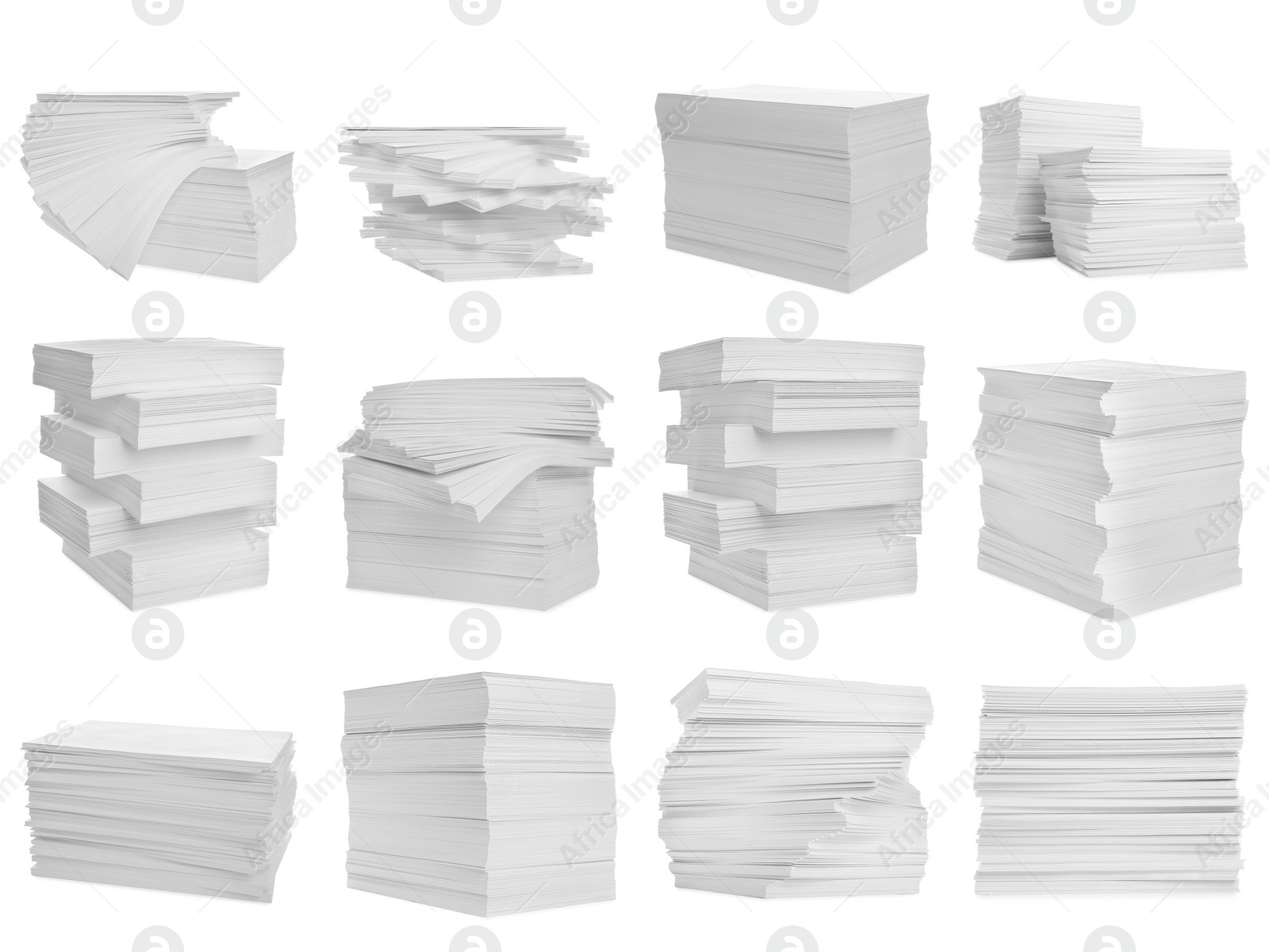 Image of Set with stacks of blank paper on white background