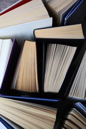 Collection of different hardcover books, closeup view