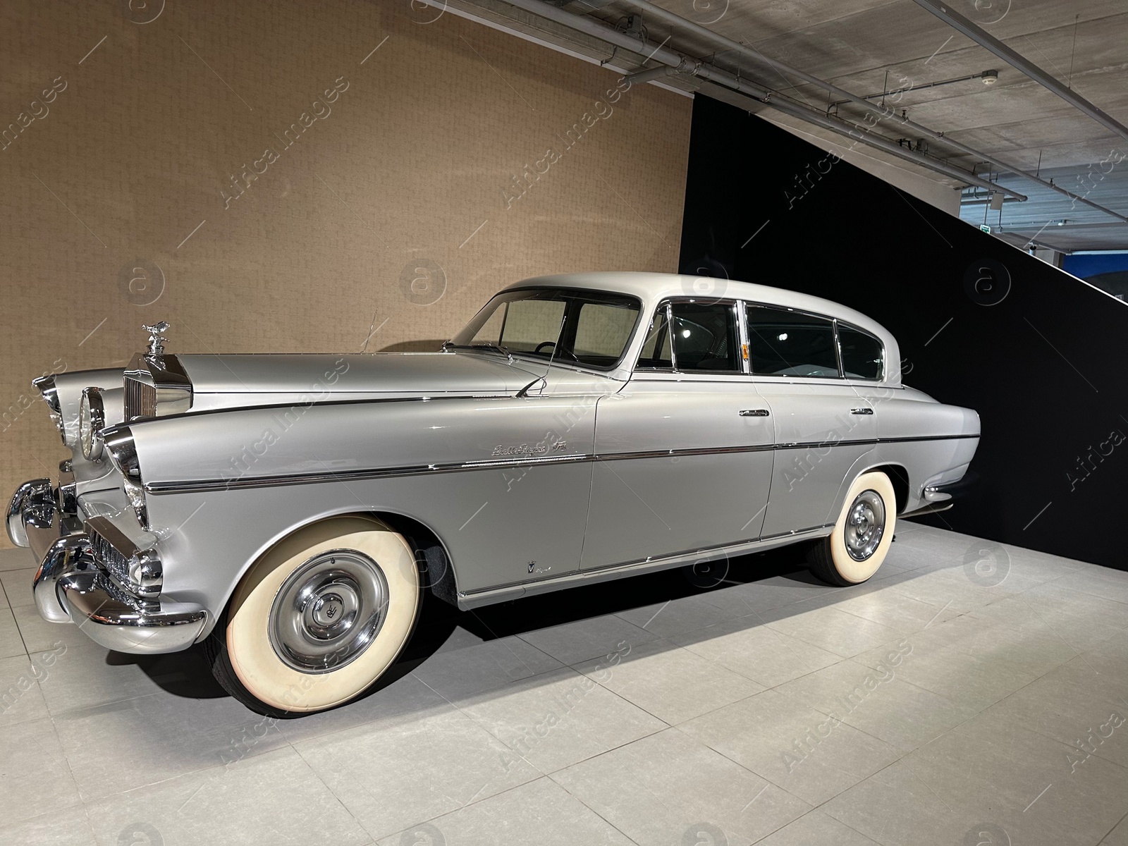 Photo of Hague, Netherlands - November 8, 2022: Beautiful view of grey retro car in Louwman museum