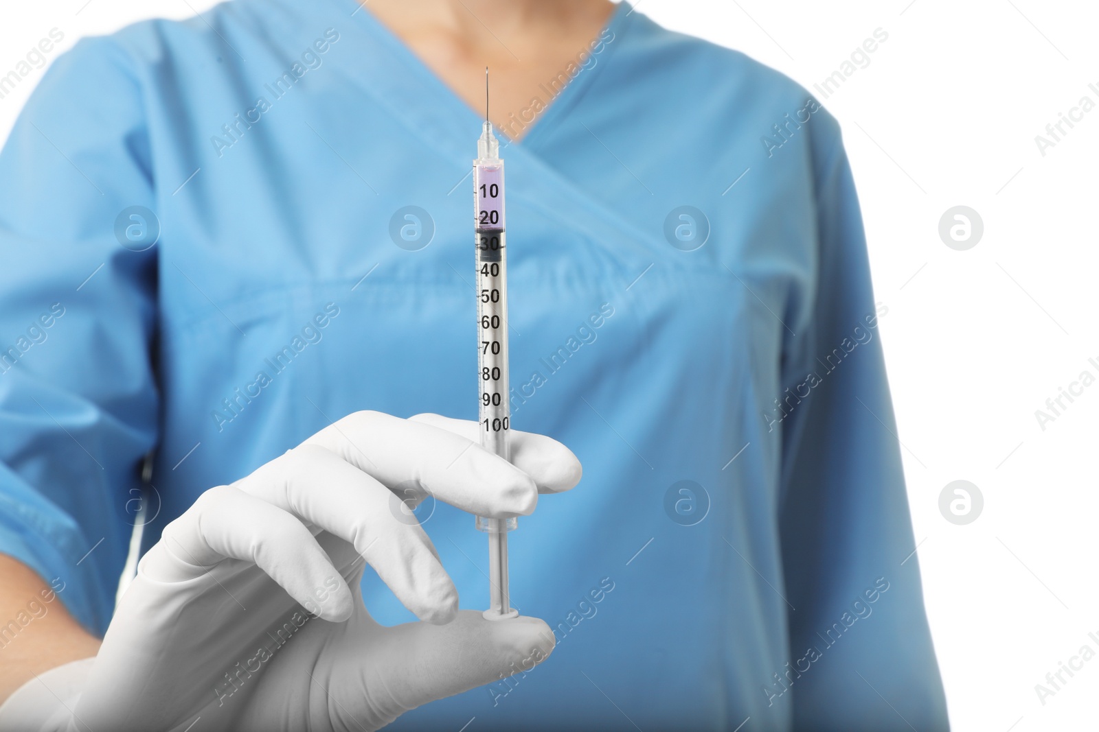 Photo of Female doctor with syringe on white background, closeup. Medical object