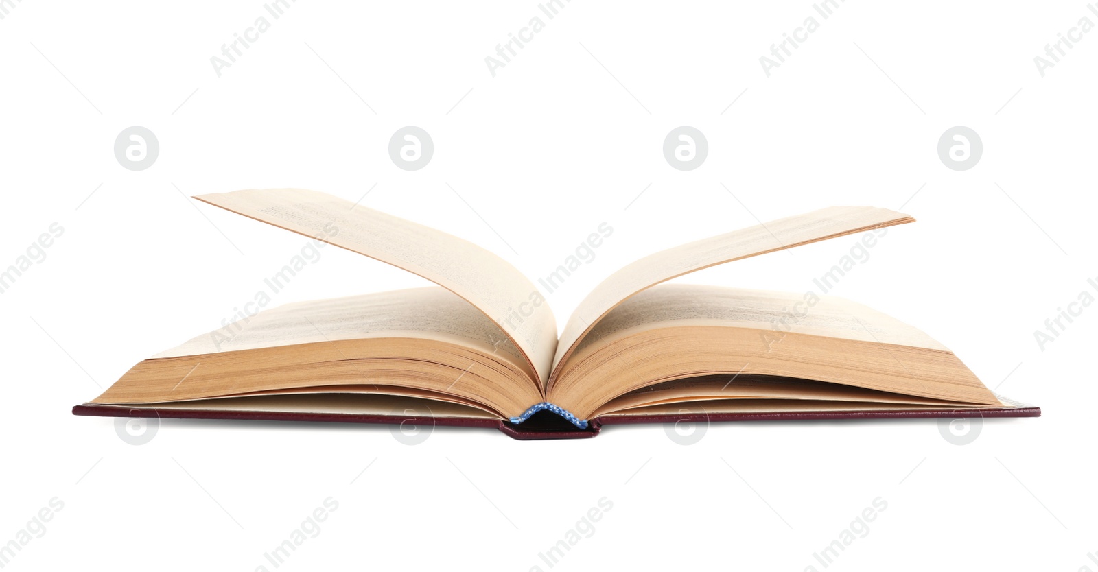 Photo of Old open hardcover book isolated on white