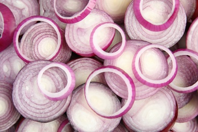 Photo of Ripe red onions as background