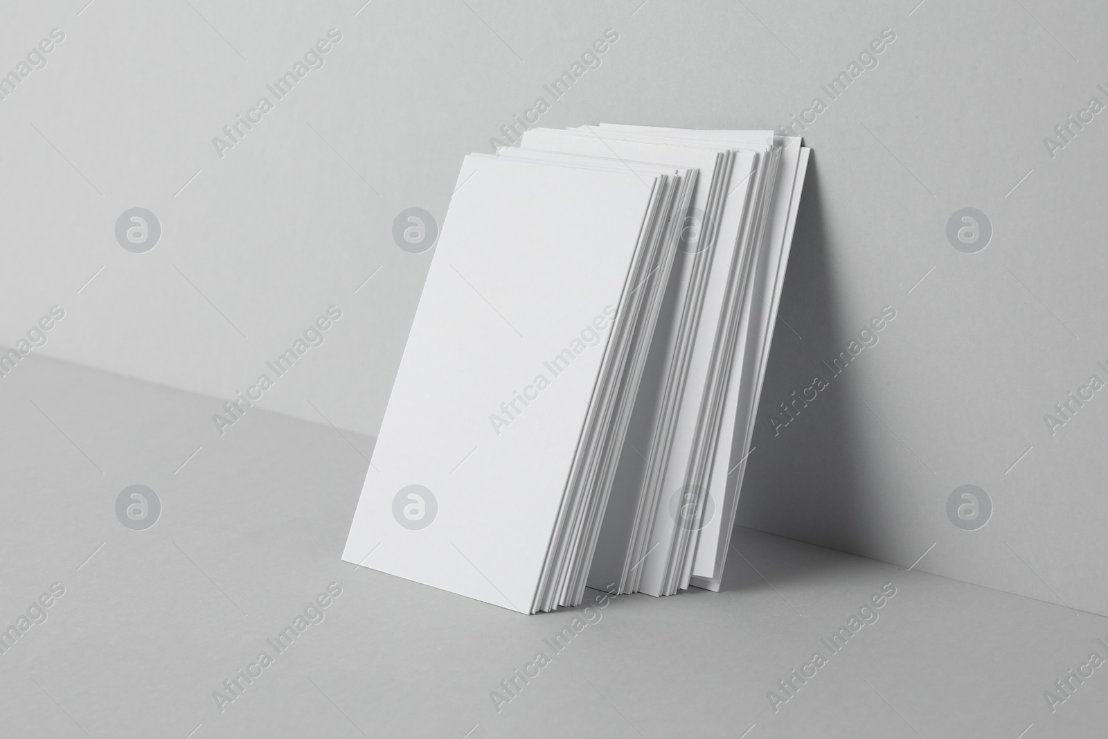 Photo of Blank business cards on light gray background. Mockup for design