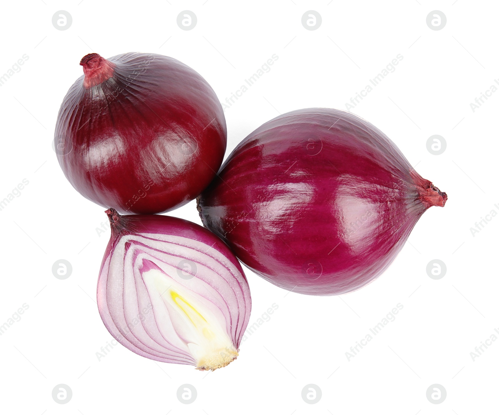 Photo of Fresh whole and cut red onions on white background, top view