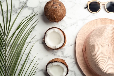 Photo of Flat lay composition with coconuts on marble background