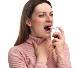 Photo of Woman using throat spray on white background