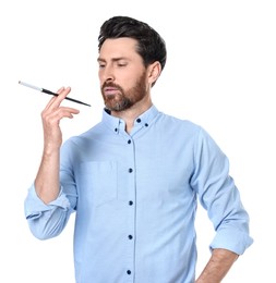 Man using long cigarette holder for smoking isolated on white