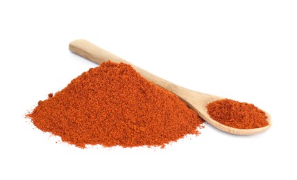 Wooden spoon and aromatic paprika powder isolated on white