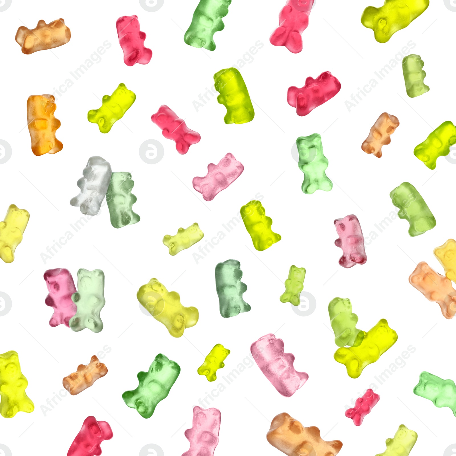 Image of Sweet gummy bears falling on white background