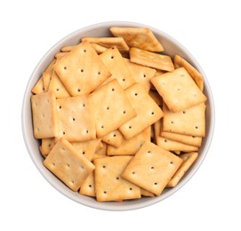 Photo of Tasty crackers in bowl isolated on white, top view
