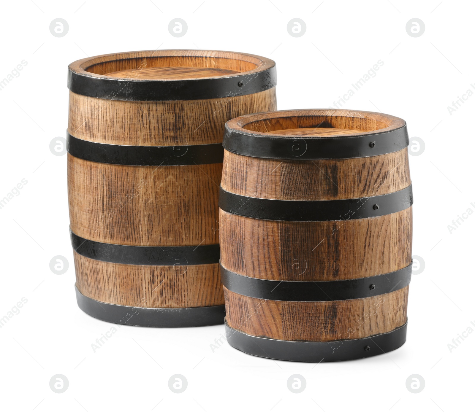 Photo of Two traditional wooden barrels isolated on white