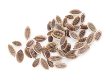 Photo of Many dry dill seeds isolated on white, top view