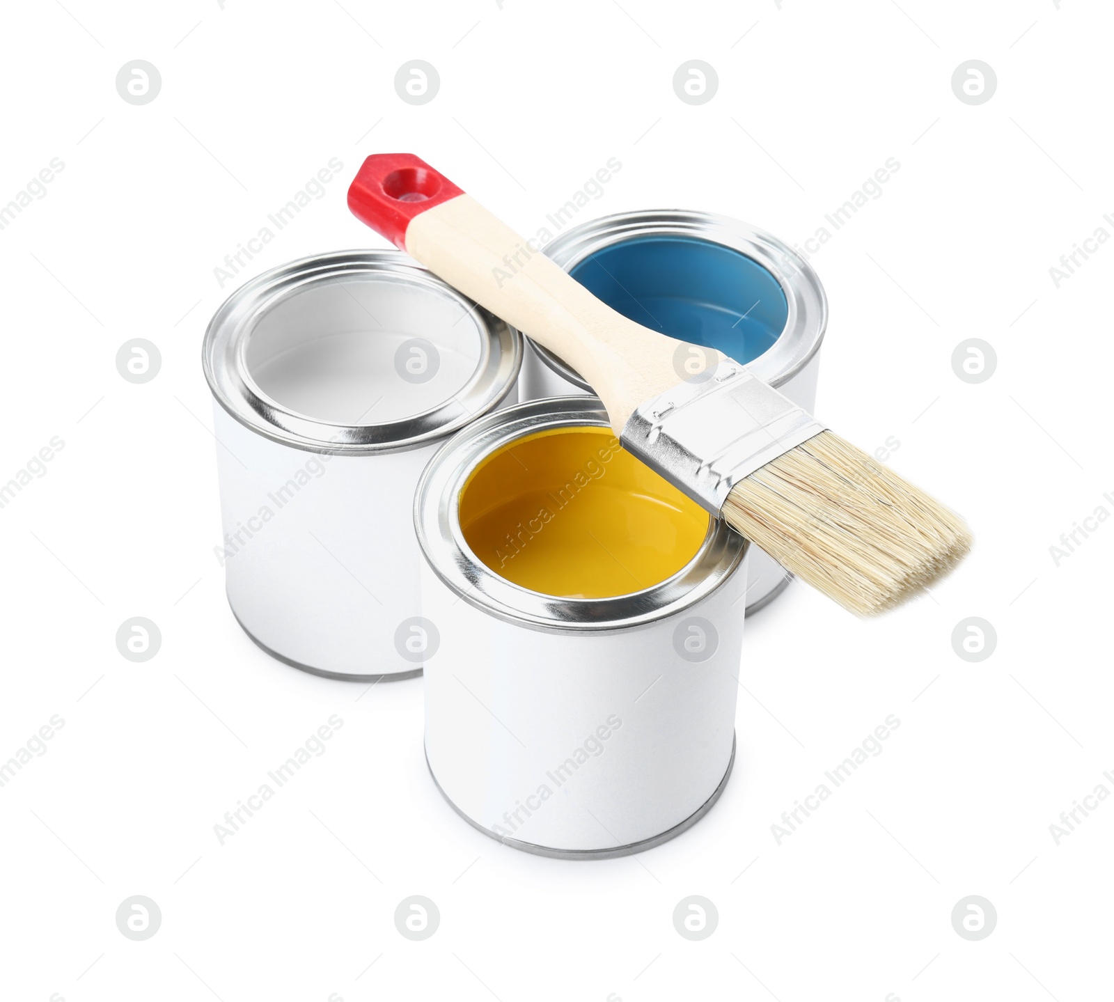 Photo of Cans of colorful paints with brush isolated on white