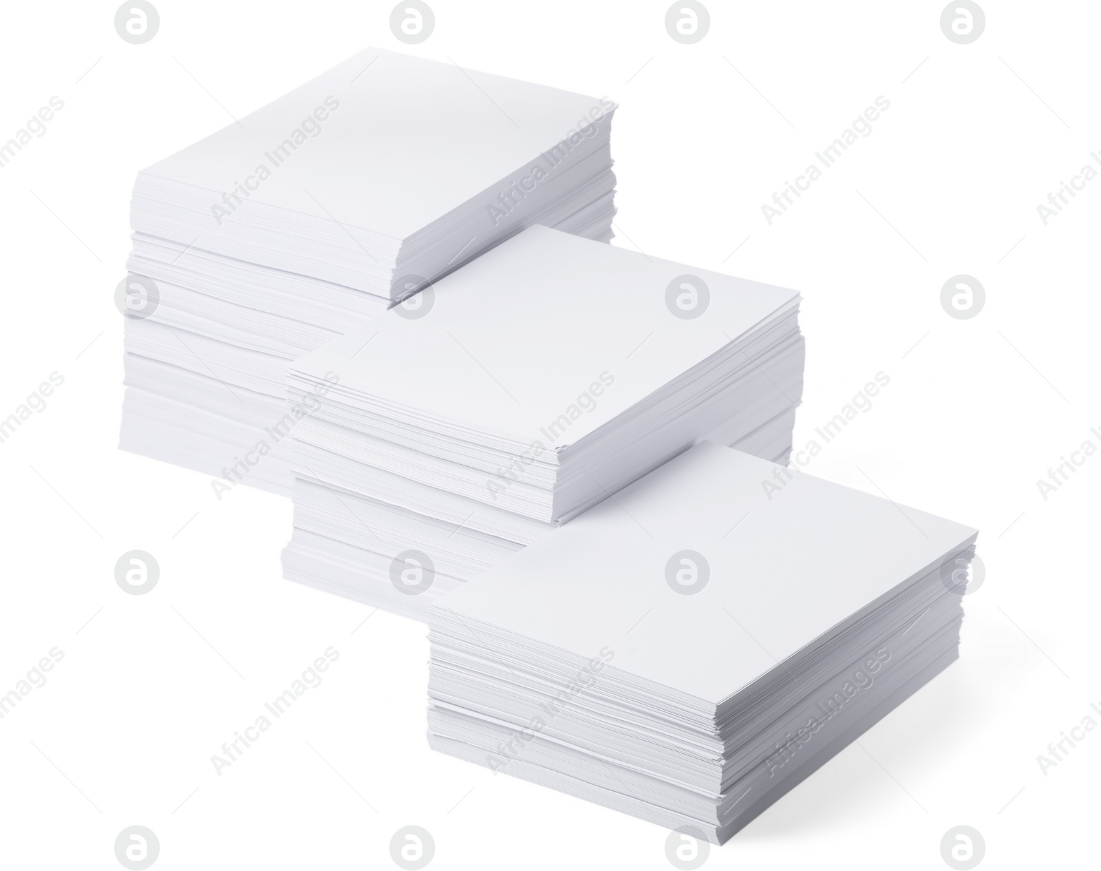 Photo of Stacks of paper sheets on white background