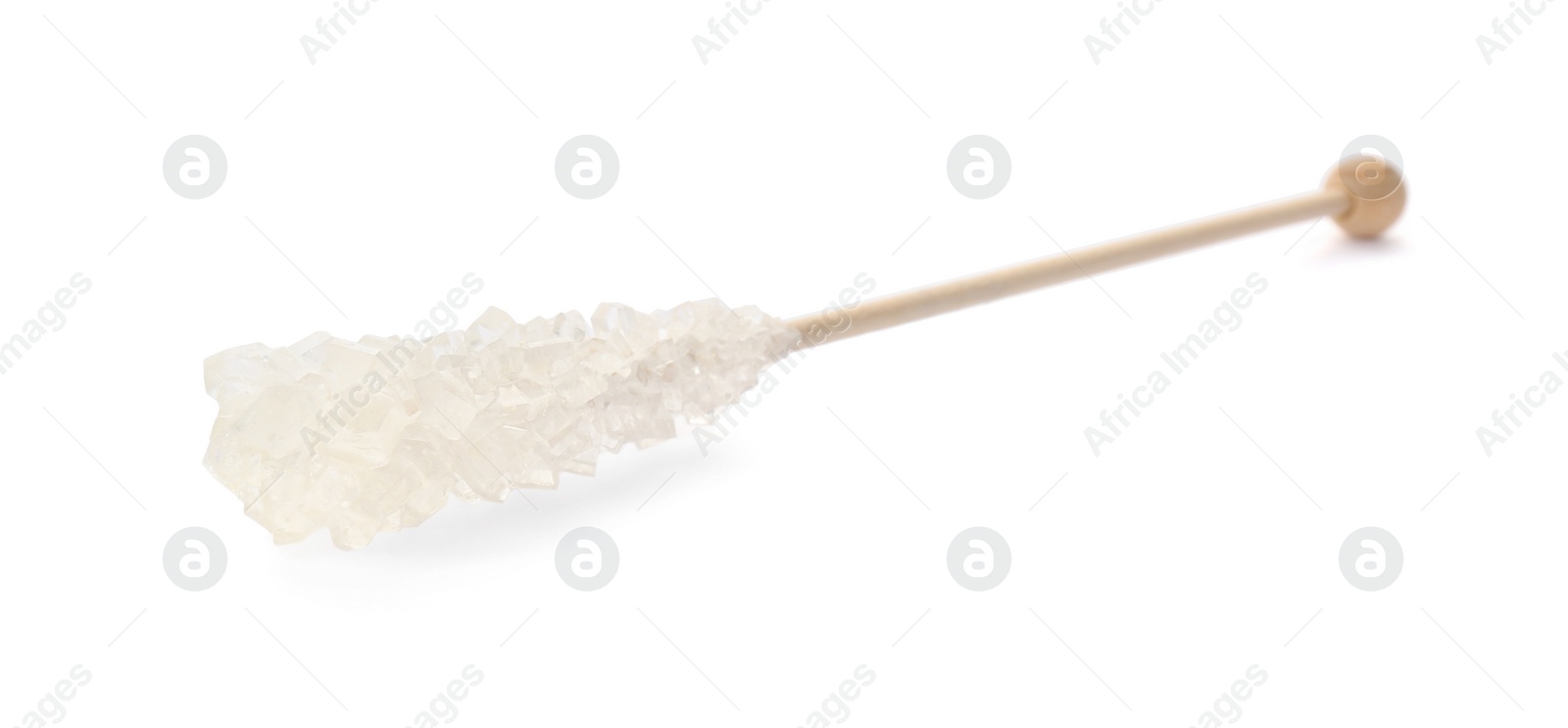Photo of Wooden stick with sugar crystals isolated on white. Tasty rock candy