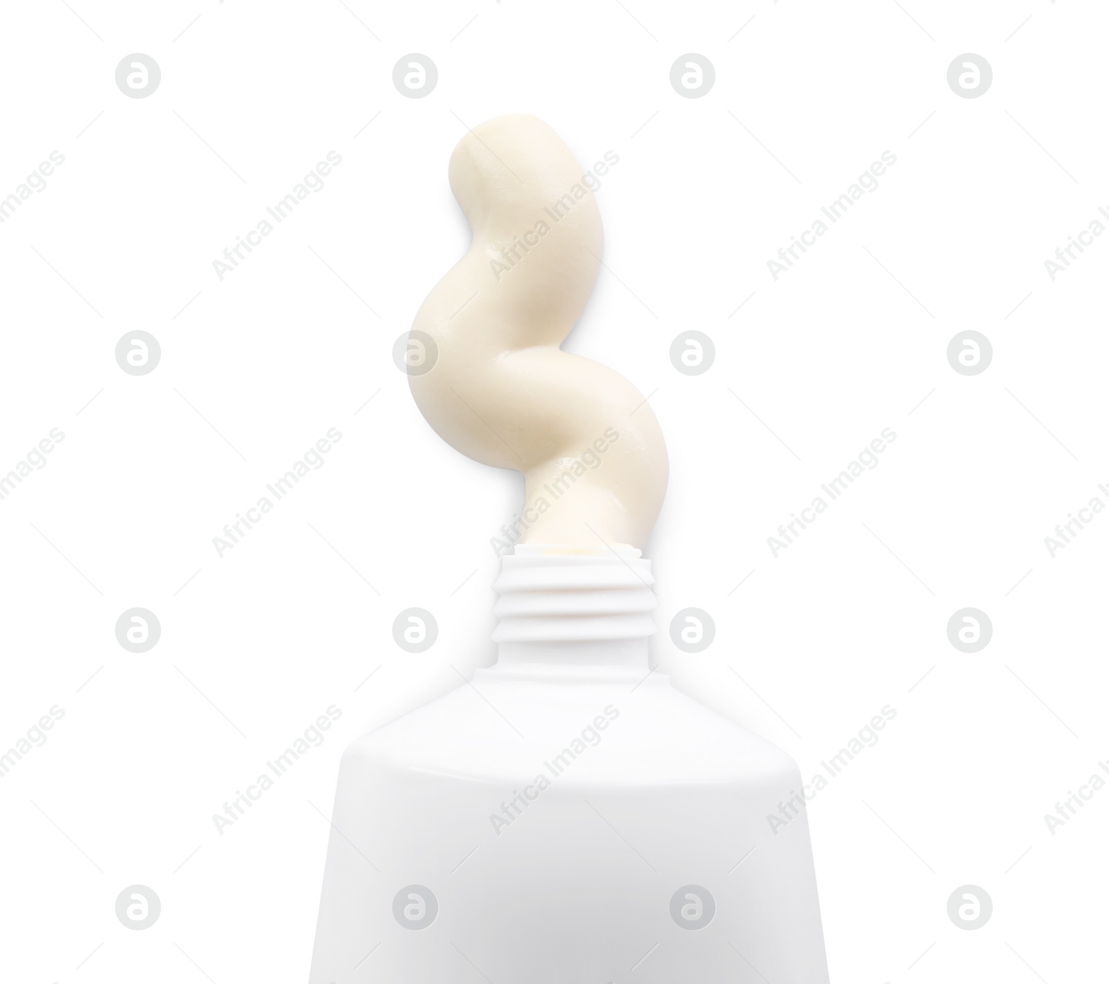 Photo of Tube with toothpaste on white background, top view. Dental care