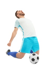 Photo of Young man playing football on white background