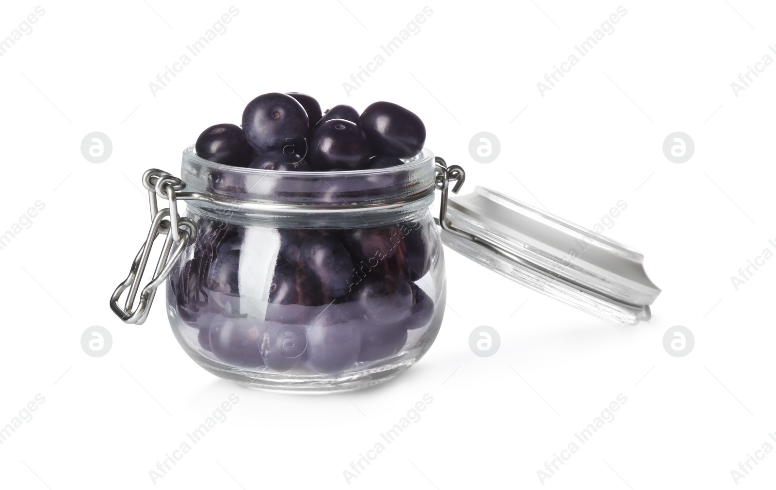 Photo of Fresh acai berries in glass jar isolated on white