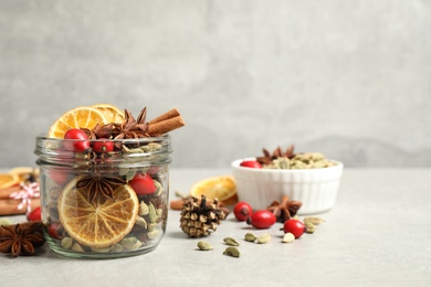 Aroma potpourri with different spices on white table, space for text