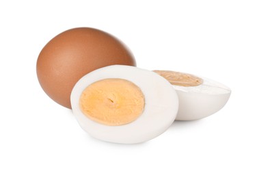 Photo of Fresh hard boiled eggs on white background