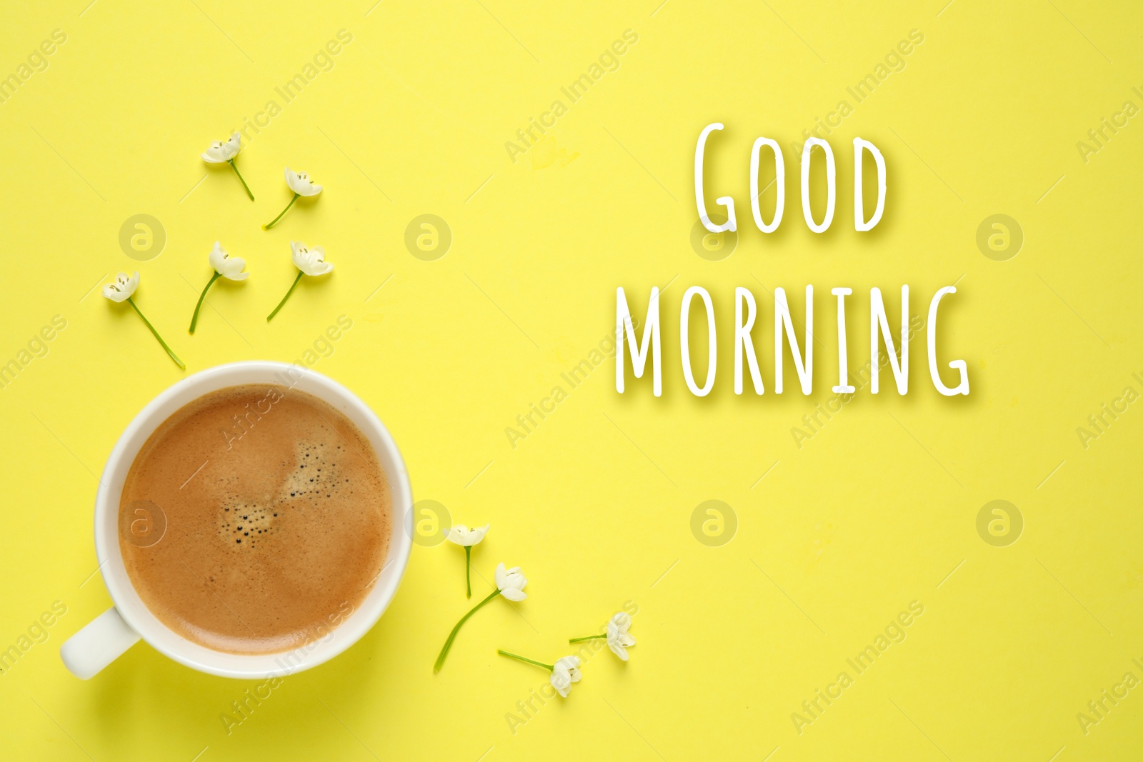 Image of White flowers and coffee on yellow background, flat lay. Good morning