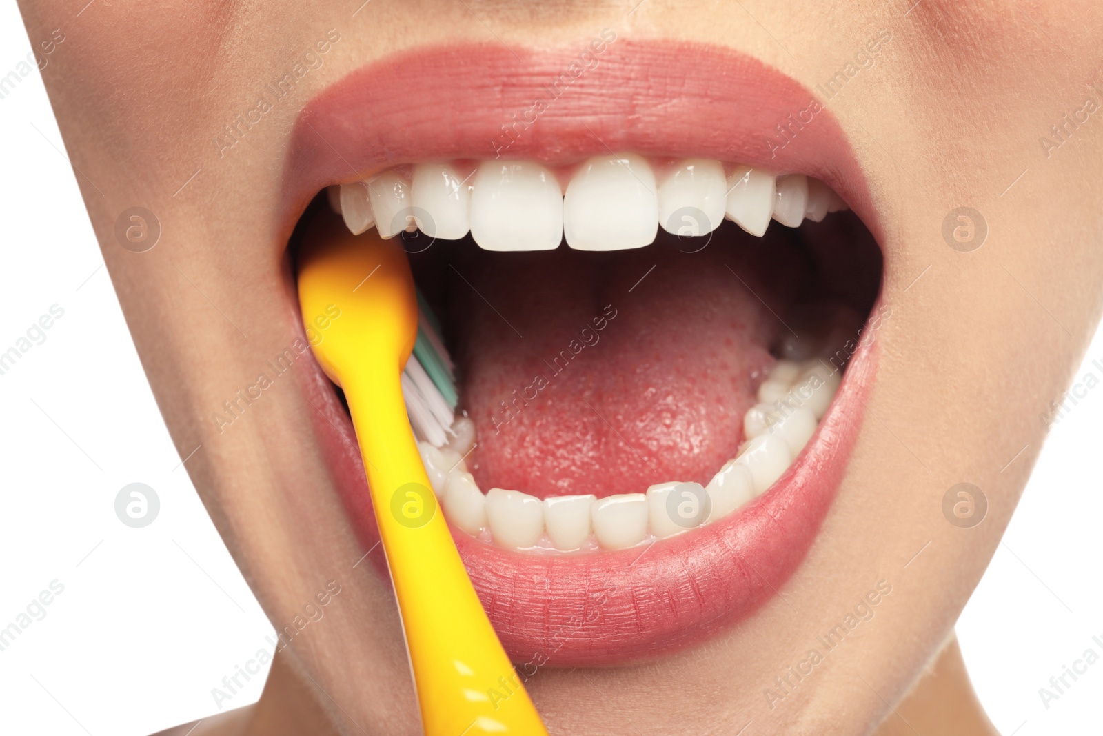 Photo of Woman brushing teeth on white background, closeup. Dental care