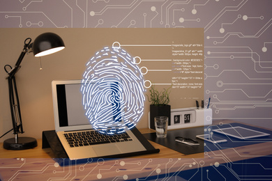 Image of Fingerprint identification. Modern laptop and devices on table indoors