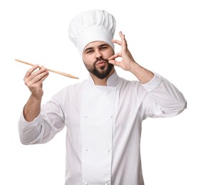 Photo of Young chef in uniform tasting something and showing perfect sign on white background