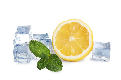 Photo of Ice cubes, mint and lemon on white background