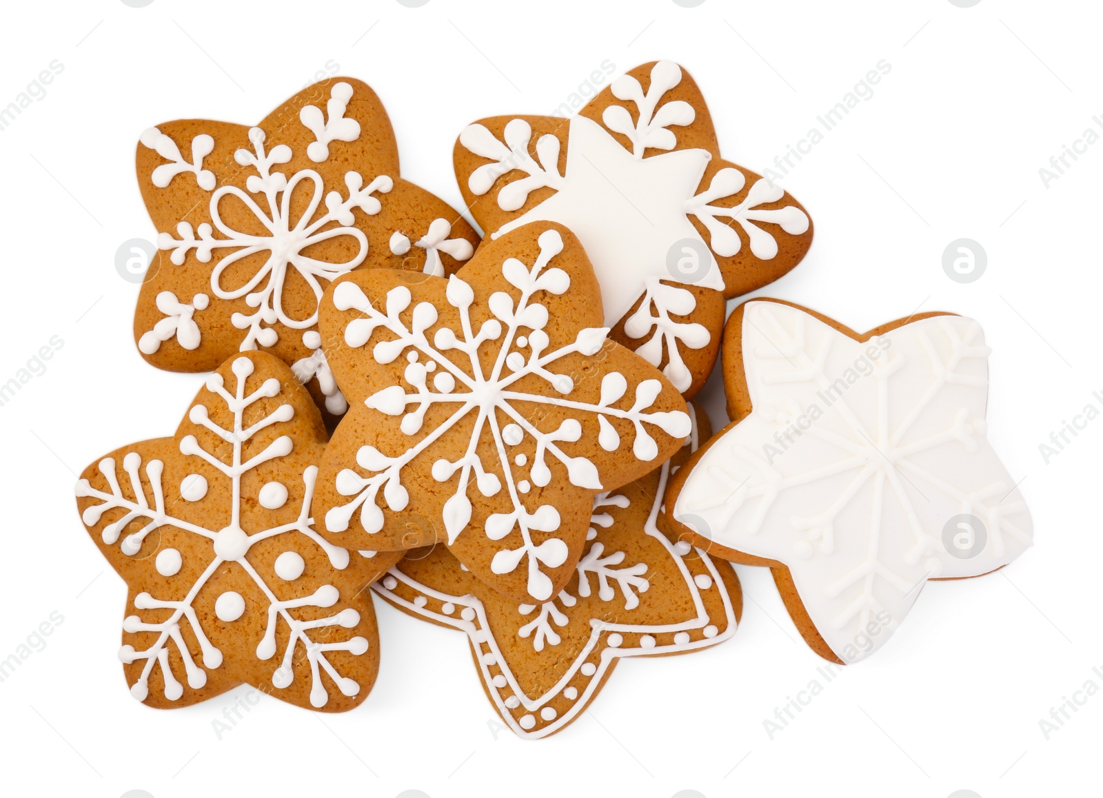 Photo of Tasty star shaped Christmas cookies with icing isolated on white, top view