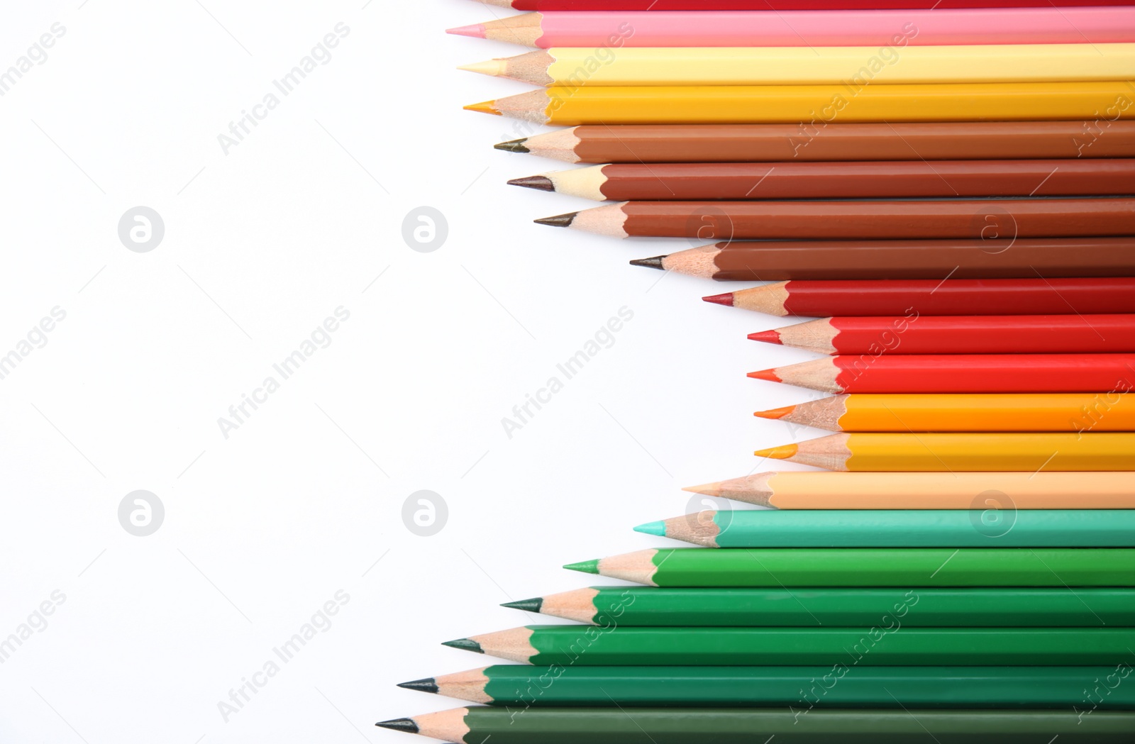 Photo of Composition with color pencils on white background, top view