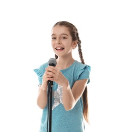 Photo of Cute girl singing in microphone on white background