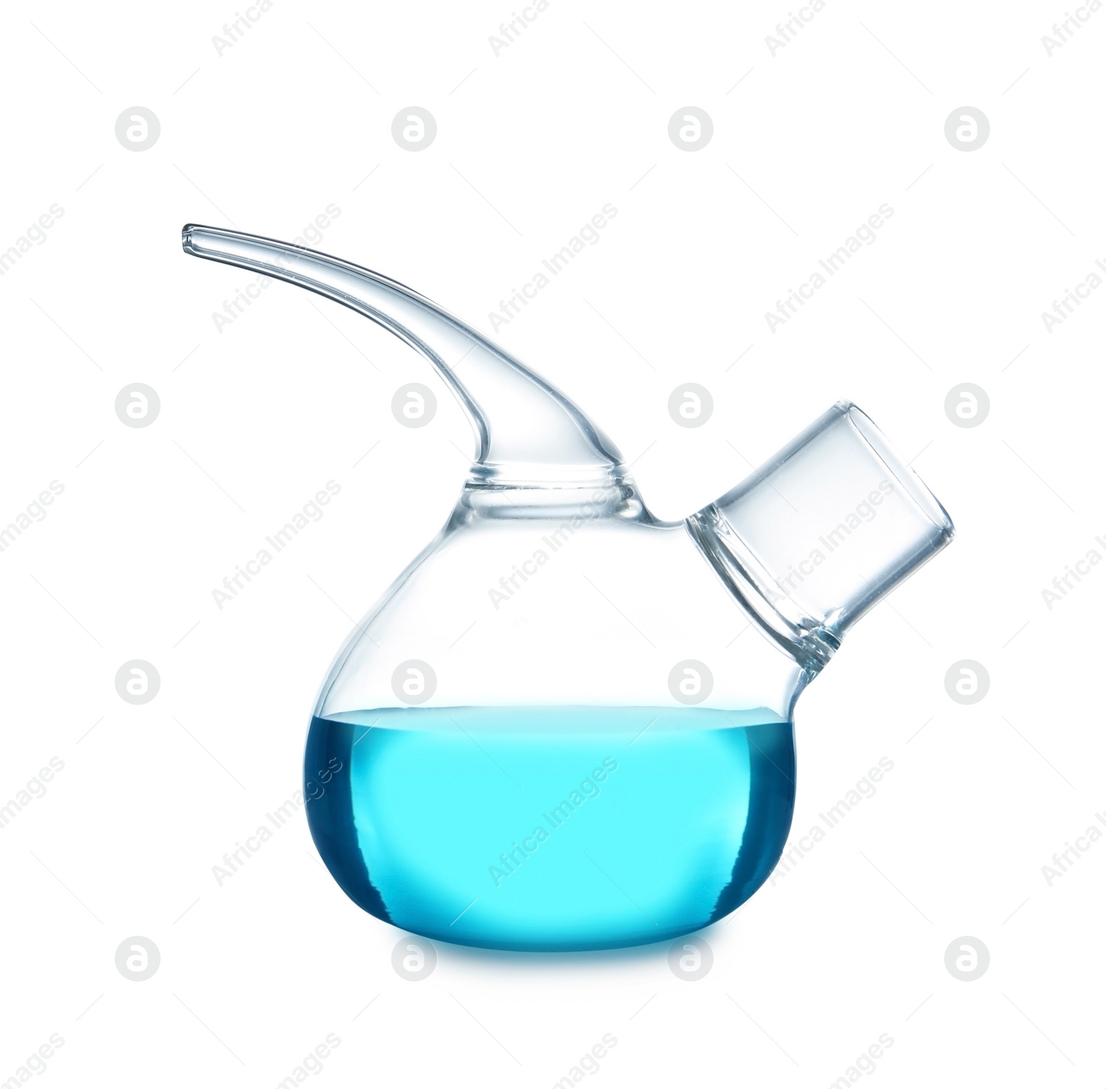 Photo of Retort flask with blue liquid on table against white background. Laboratory analysis