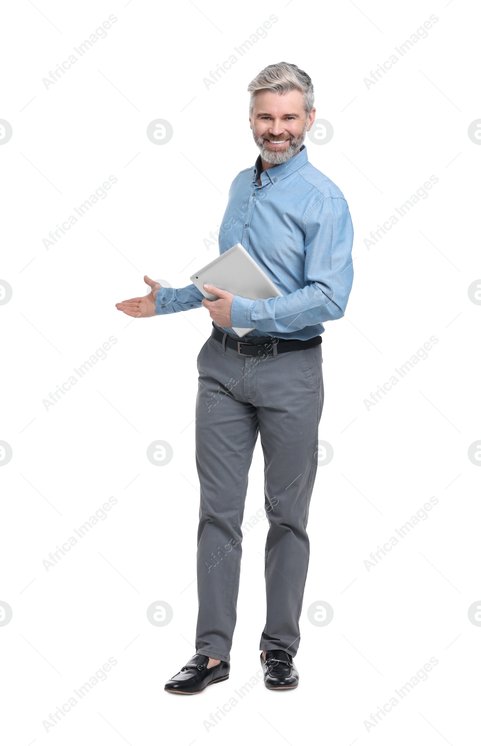 Photo of Mature businessman in stylish clothes with tablet on white background